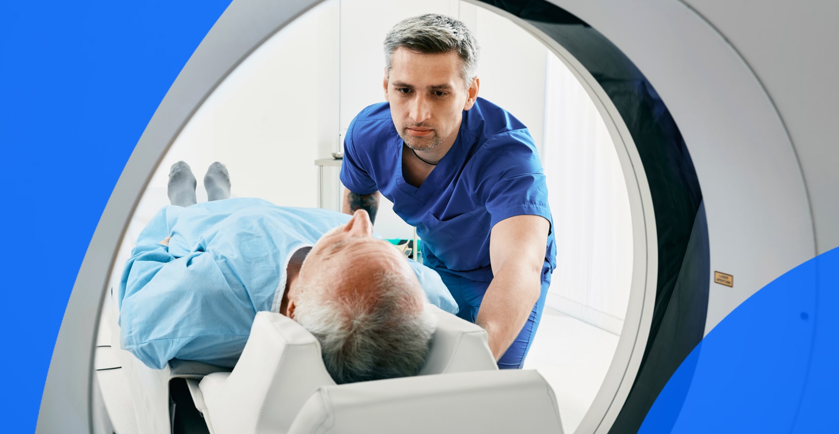 Patient with technician getting a CT scan
